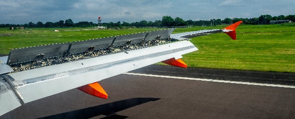 ground spoilers→lift↓ upon landing